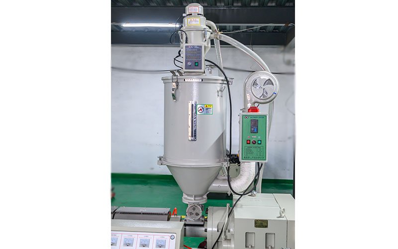 Automatic drier and loader with hopper